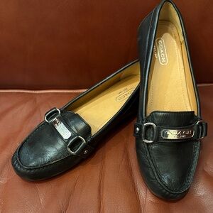 COACH Black soft leather Felisha Driving Loafers with Silver Logo Hardware.